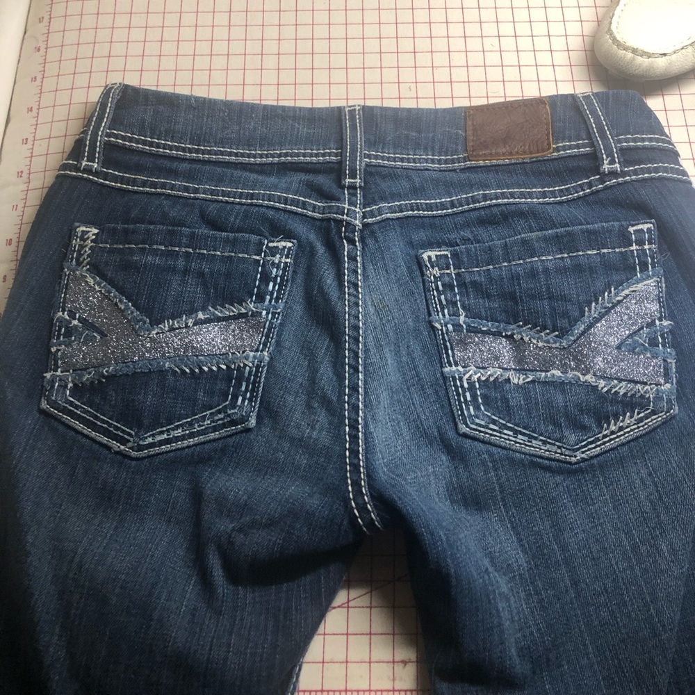 BKE jeans flared with silver ribbon on pockets